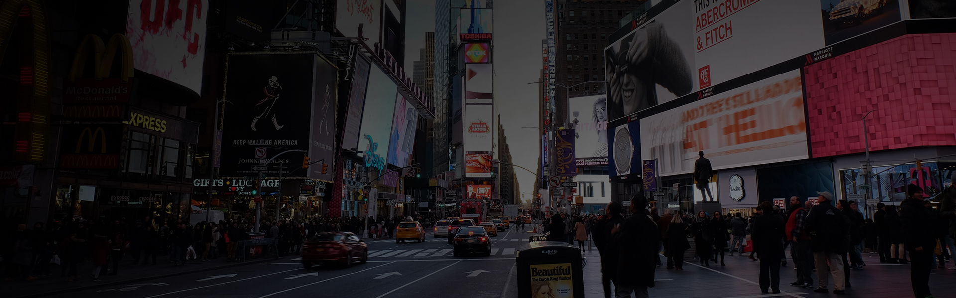 Large outdoor billboards glowing at night